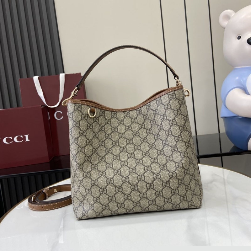 G*u*i top handle bags